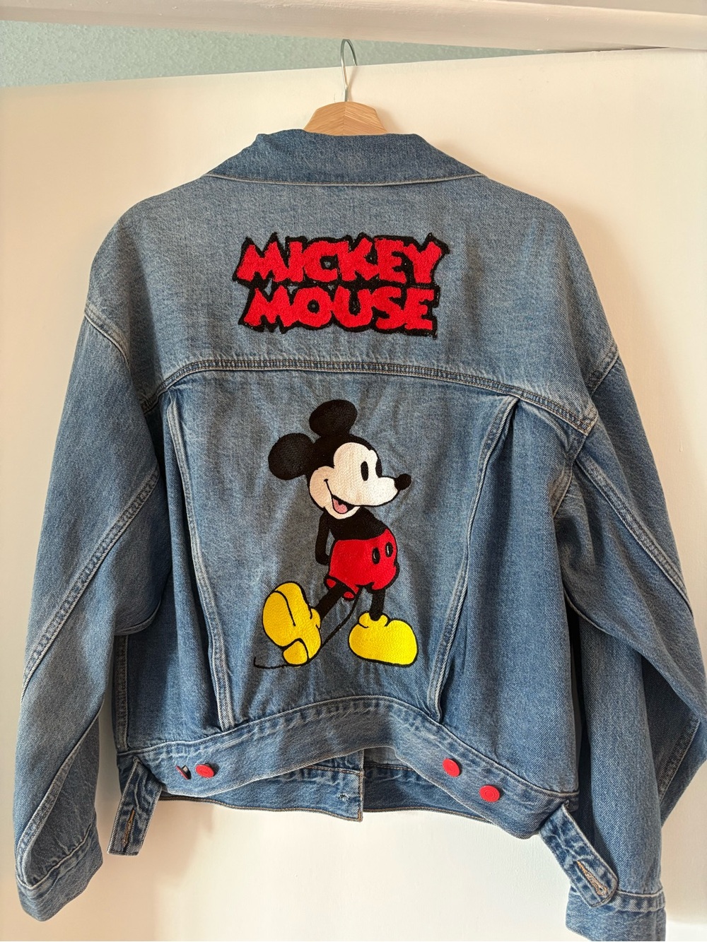 Levi's Women's Light Wash Denim Trucker Jacket with Red Accent Buttons